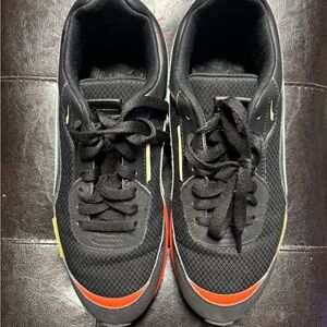 Puma Black and Red Sneakers with Yellow Accents